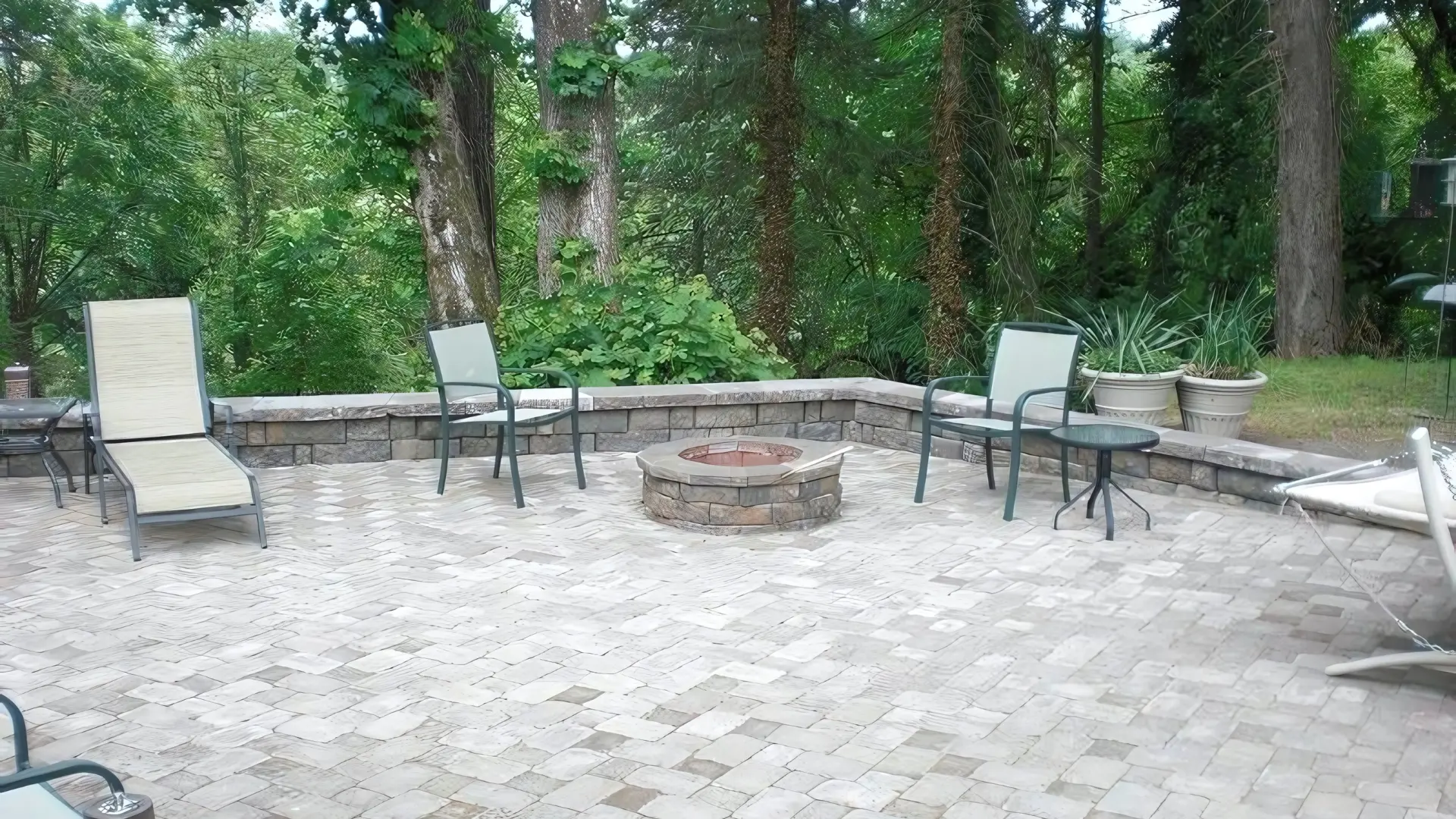 Stunning modern backyard landscape transformation by AR Landscape Inc with outdoor lighting and water features